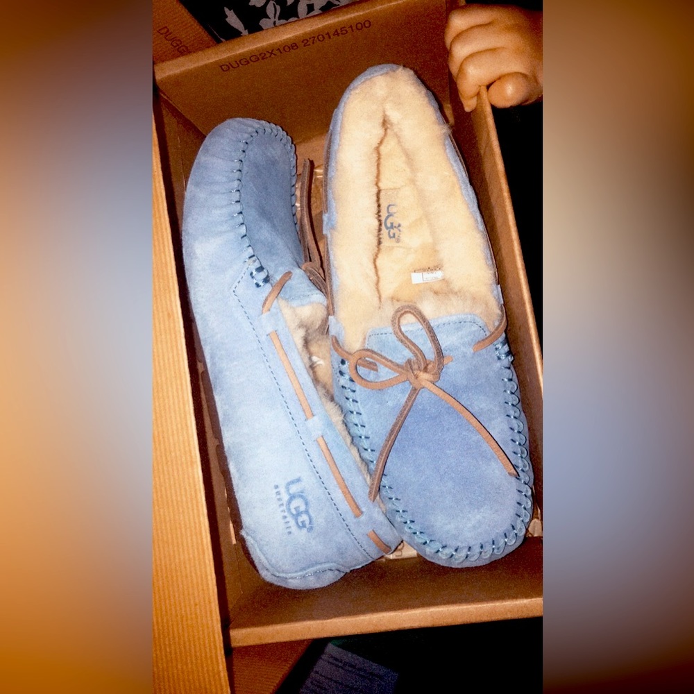 Woman’s UGG slippers. Brand new in box, never worn.